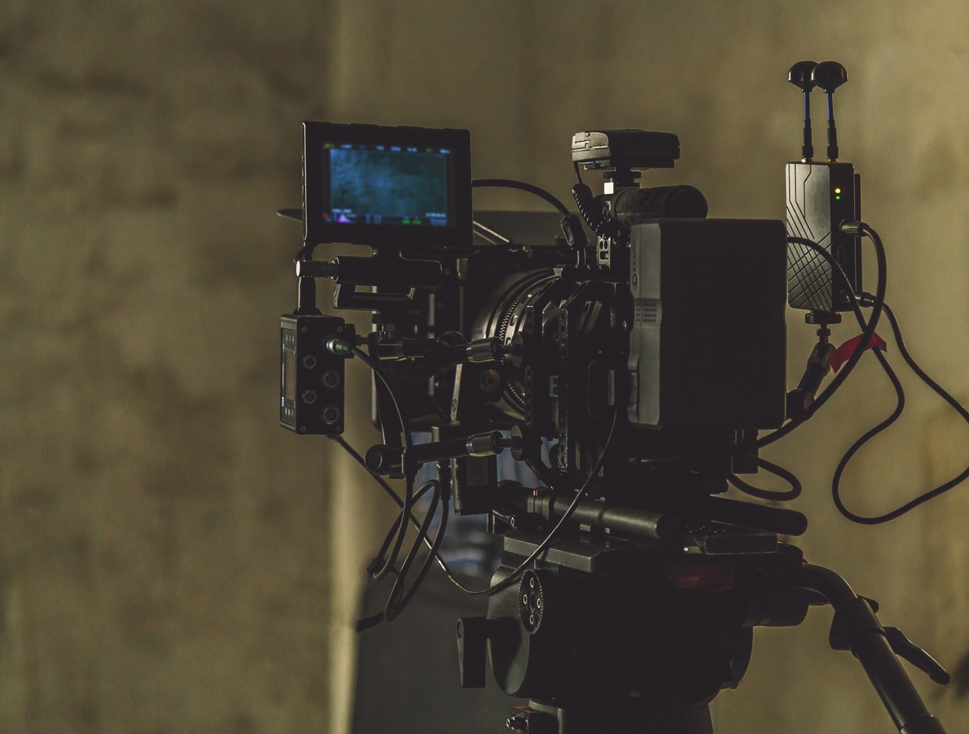 A cinema camera rigged on a set